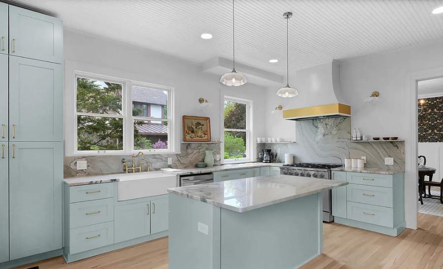 Adornus light blue kitchen with marble-look counters — manufacturer photo