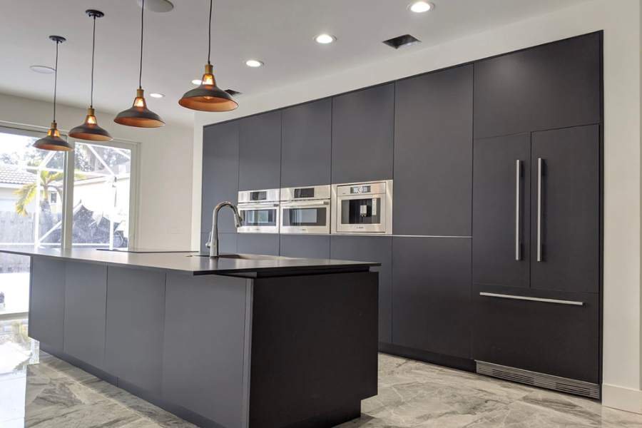 Adornus Alusso black slab kitchen — manufacturer photo