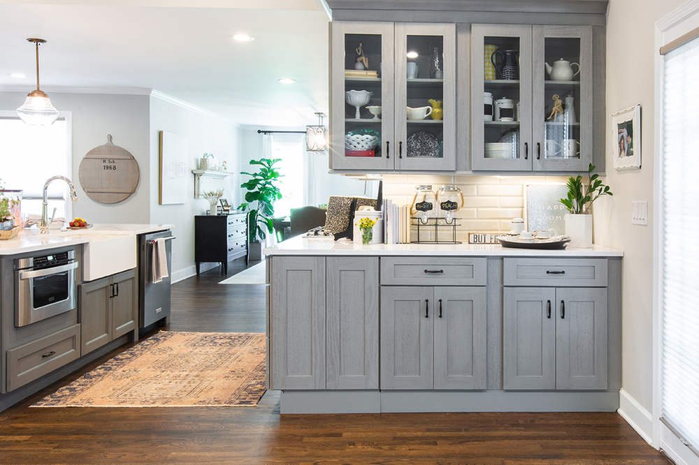 Forevermark grey shaker kitchen with glass uppers — manufacturer photo