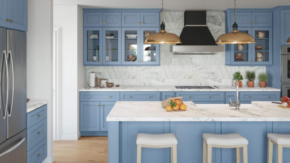 Forevermark blue shaker kitchen with a white island — manufacturer photo