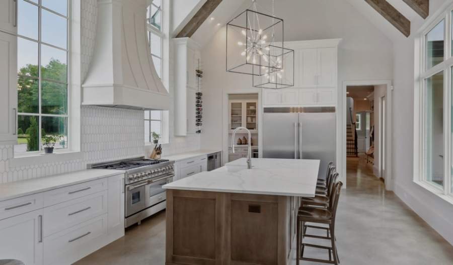 Homestead II in Bright White with a natural vintage maple island — Kith Kitchens photo