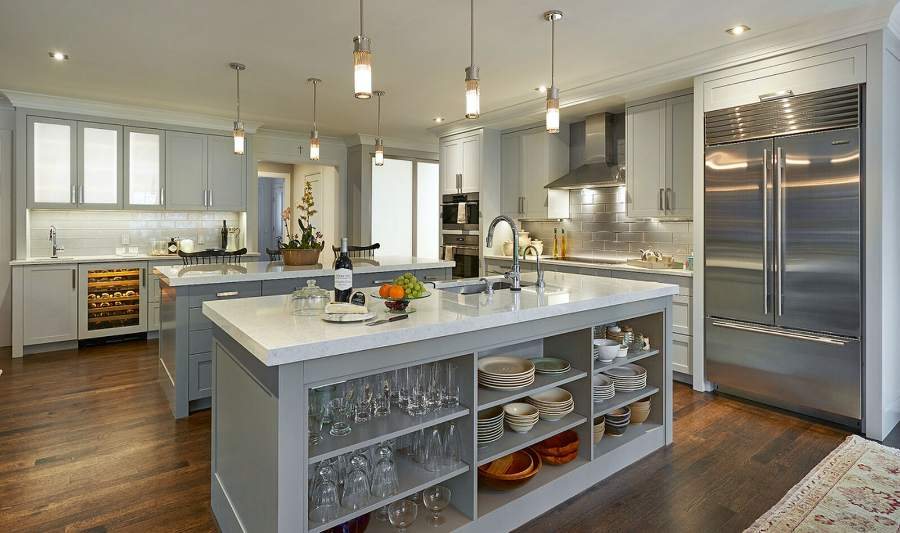 Plain & Fancy white kitchen with a grey island and open shelving — manufacturer photo