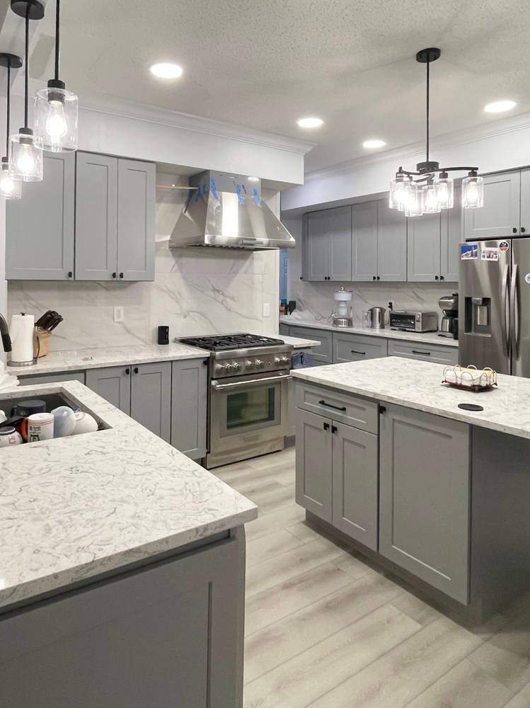 WoodConcept Element Ash grey shaker kitchen with a quartz island — manufacturer photo