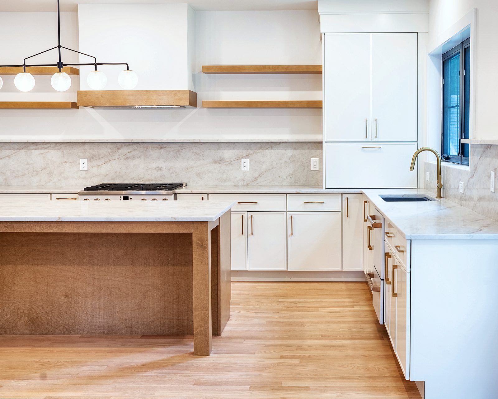 Full-height quartz backsplash and open shelves