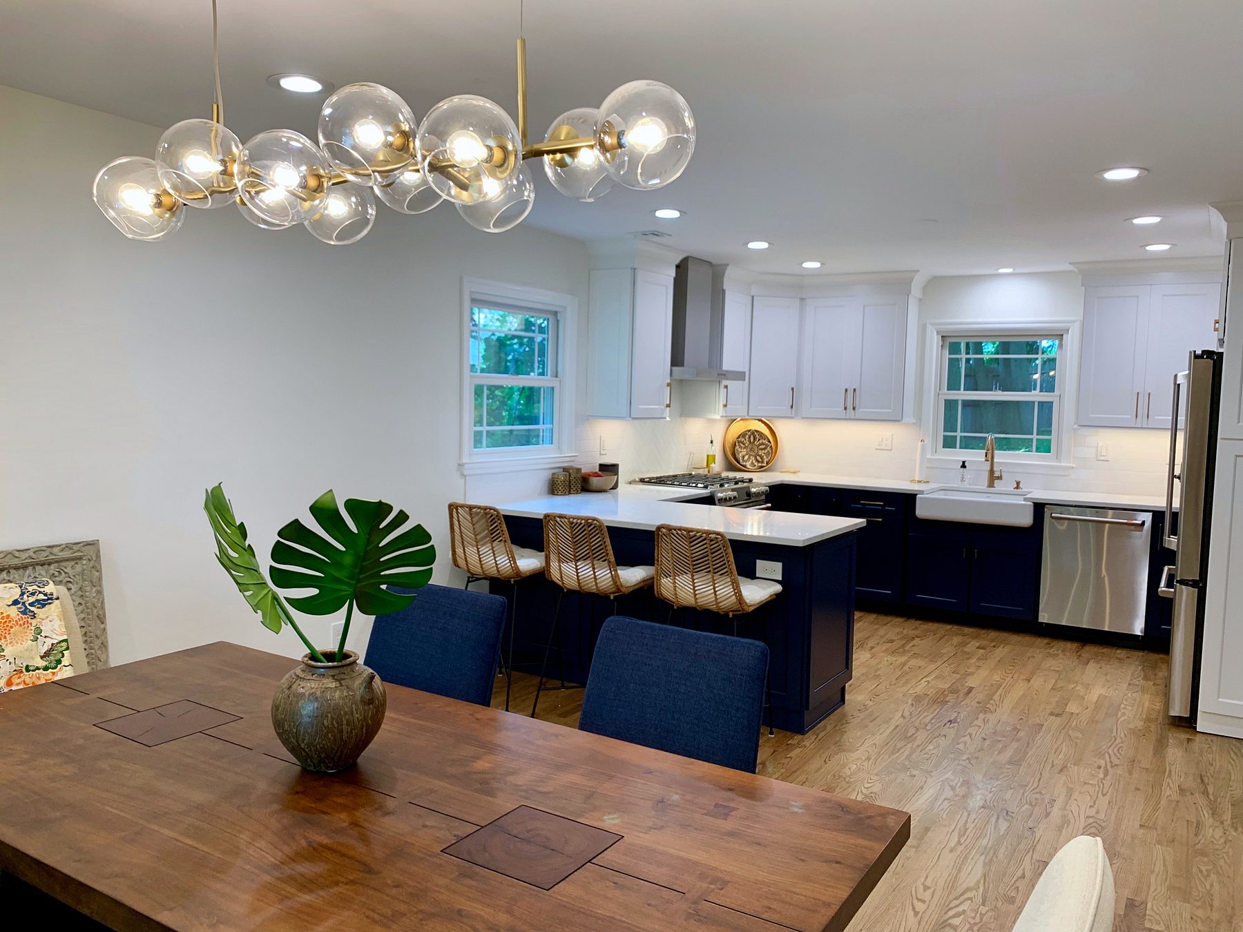 Kith Homestead kitchen in Bright White and Naval with Cashmere Carrara quartz