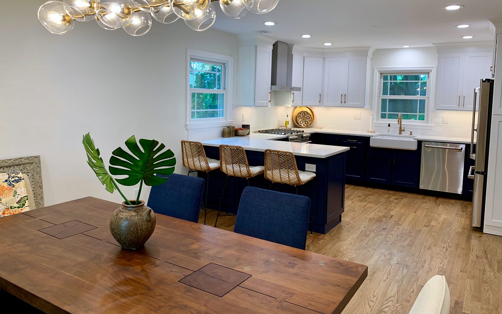 Cashmere Carrara quartz (archive label) — Kith Homestead kitchen in Bright White and Naval with Cashmere Carrara quartz