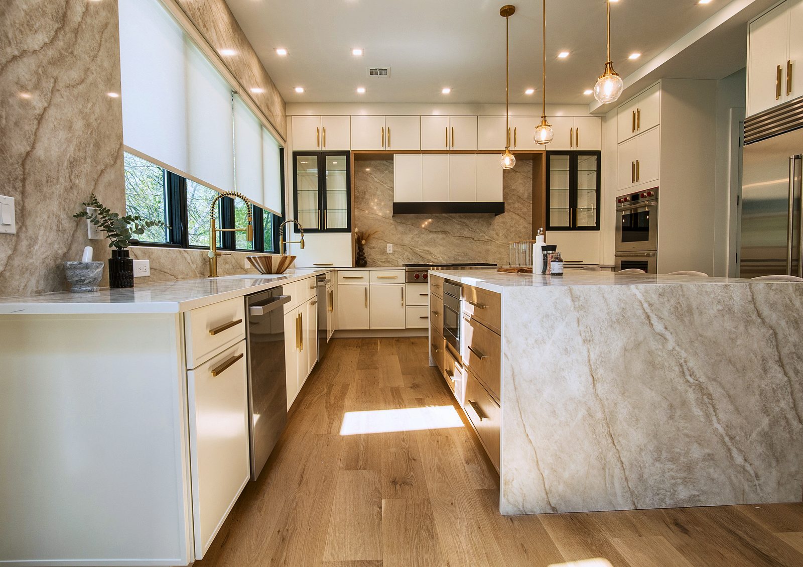 Island end with Sub-Zero refrigerator wall