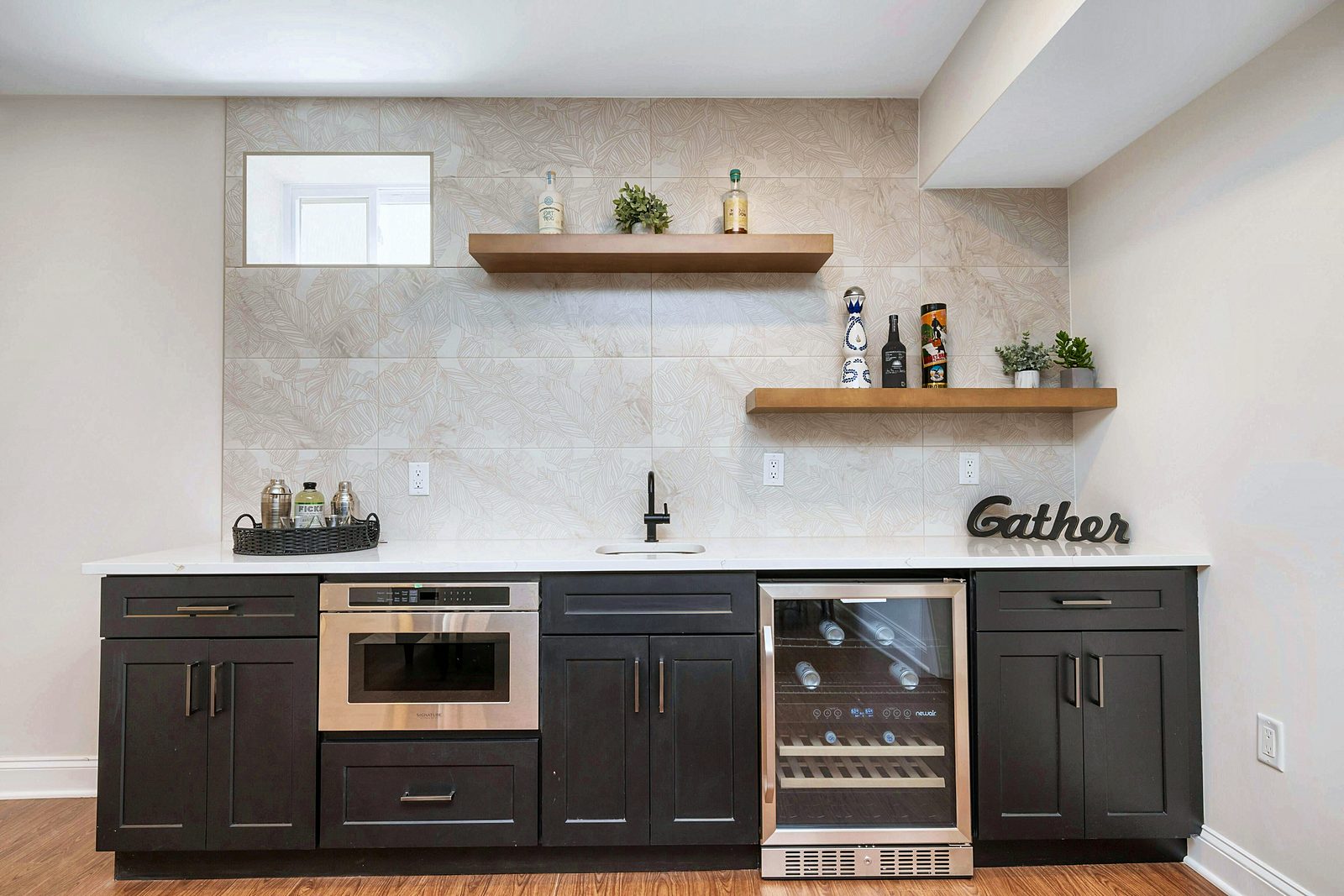 Basement bar in black with floating shelves