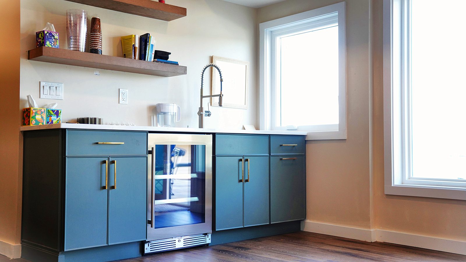 Teal bar with beverage center