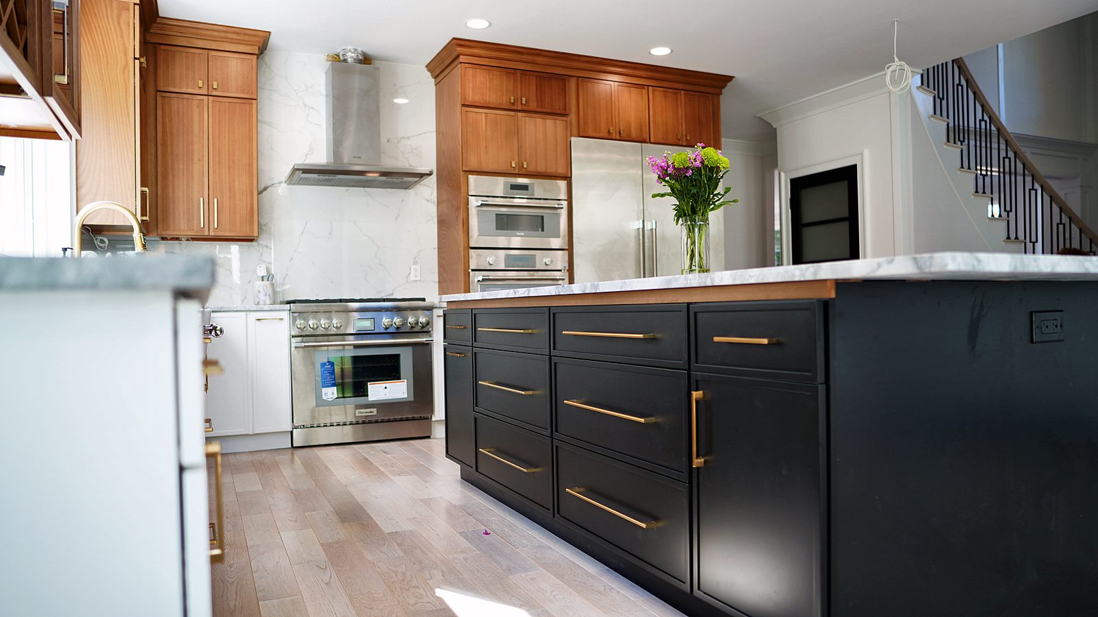 Midnight island with brass bar pulls