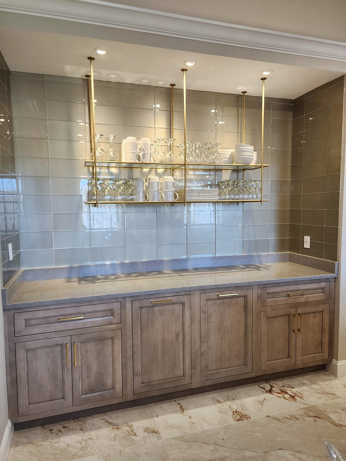 Shiloh Aspen inset kitchen in a brown stain with a lit bar wall and a butler’s pantry — photo 10