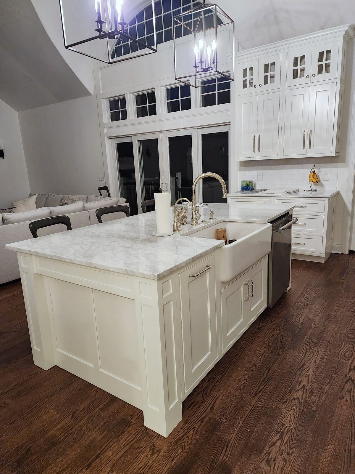 Shiloh Heritage beaded-inset kitchen under a vaulted ceiling with a curved hood — photo 7