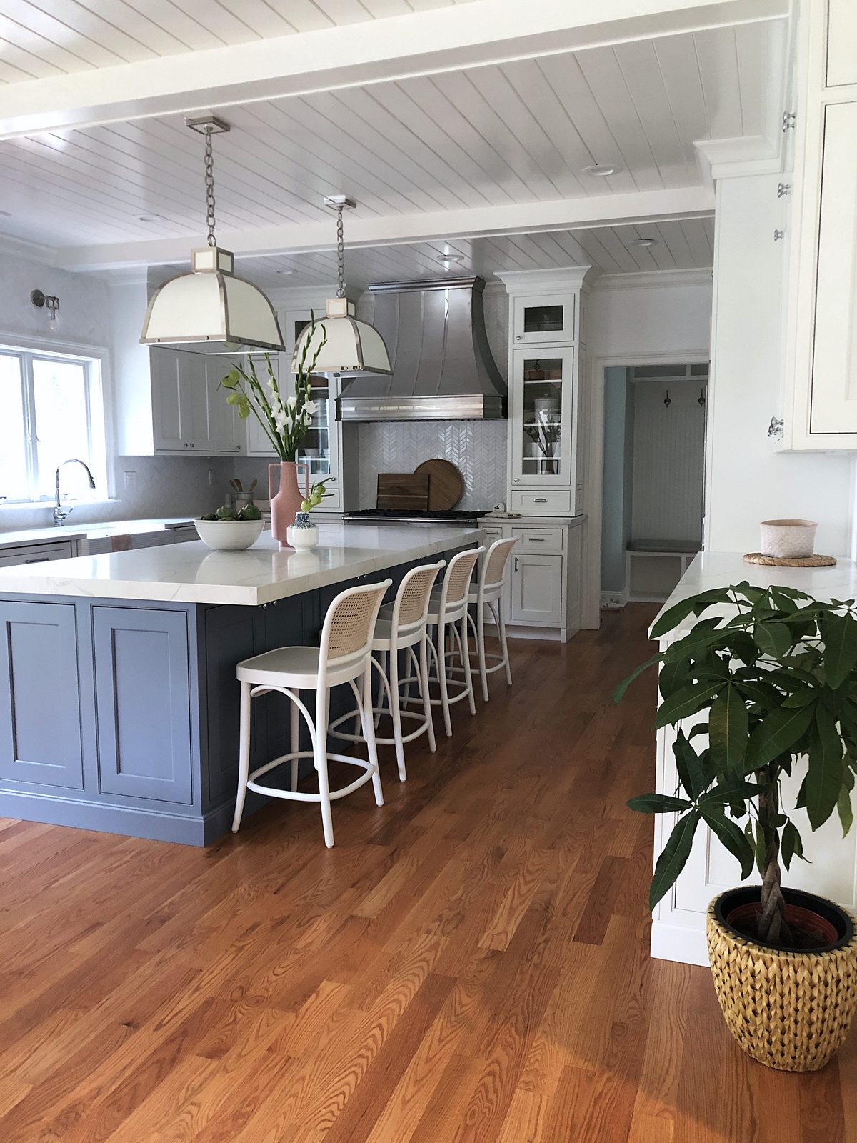 Shiloh Heritage door, Polar perimeter and navy island (archive label) — Shiloh Heritage in Polar with a navy island and Calacatta Leon