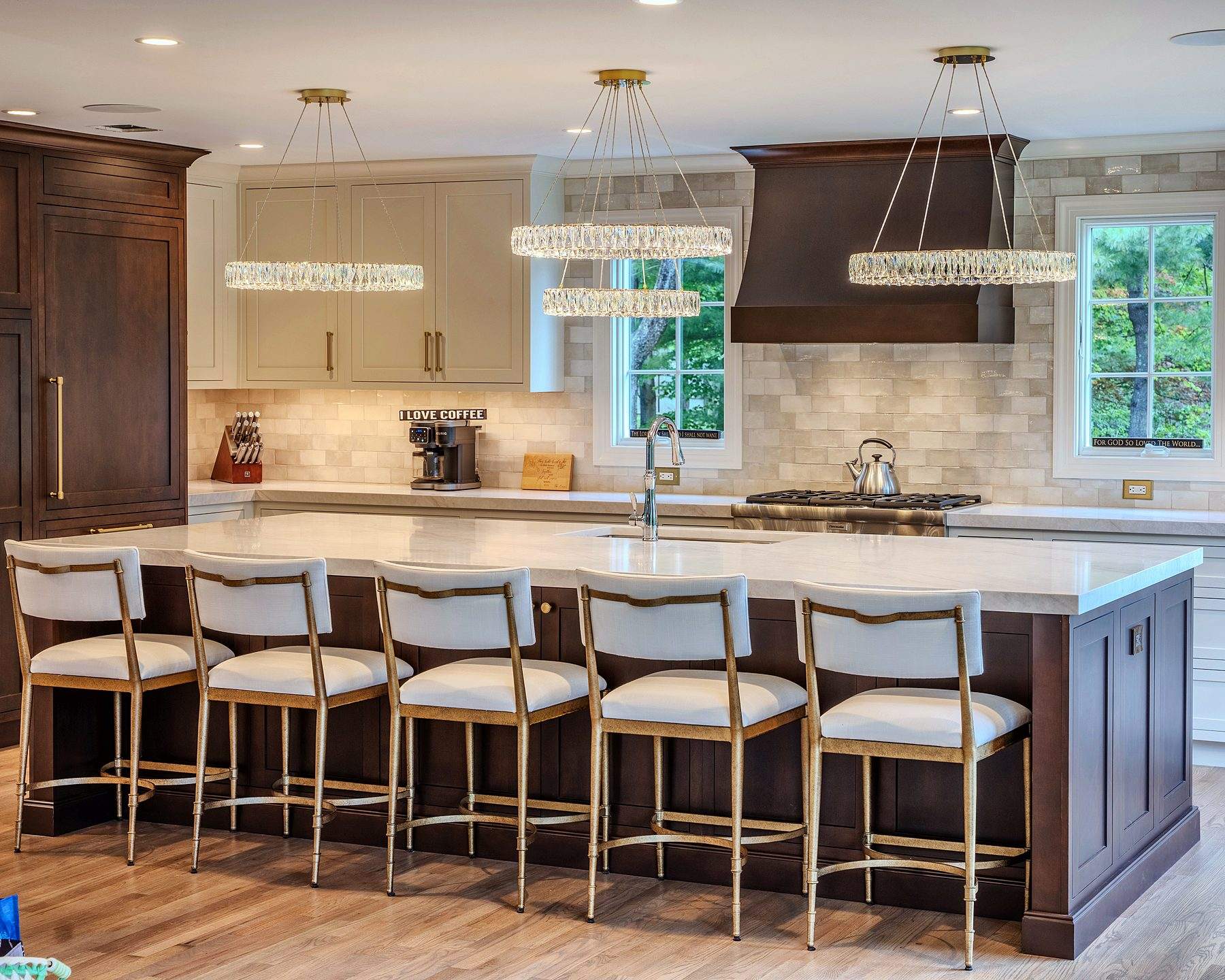 Soft White kitchen with Sable-stained island seating six