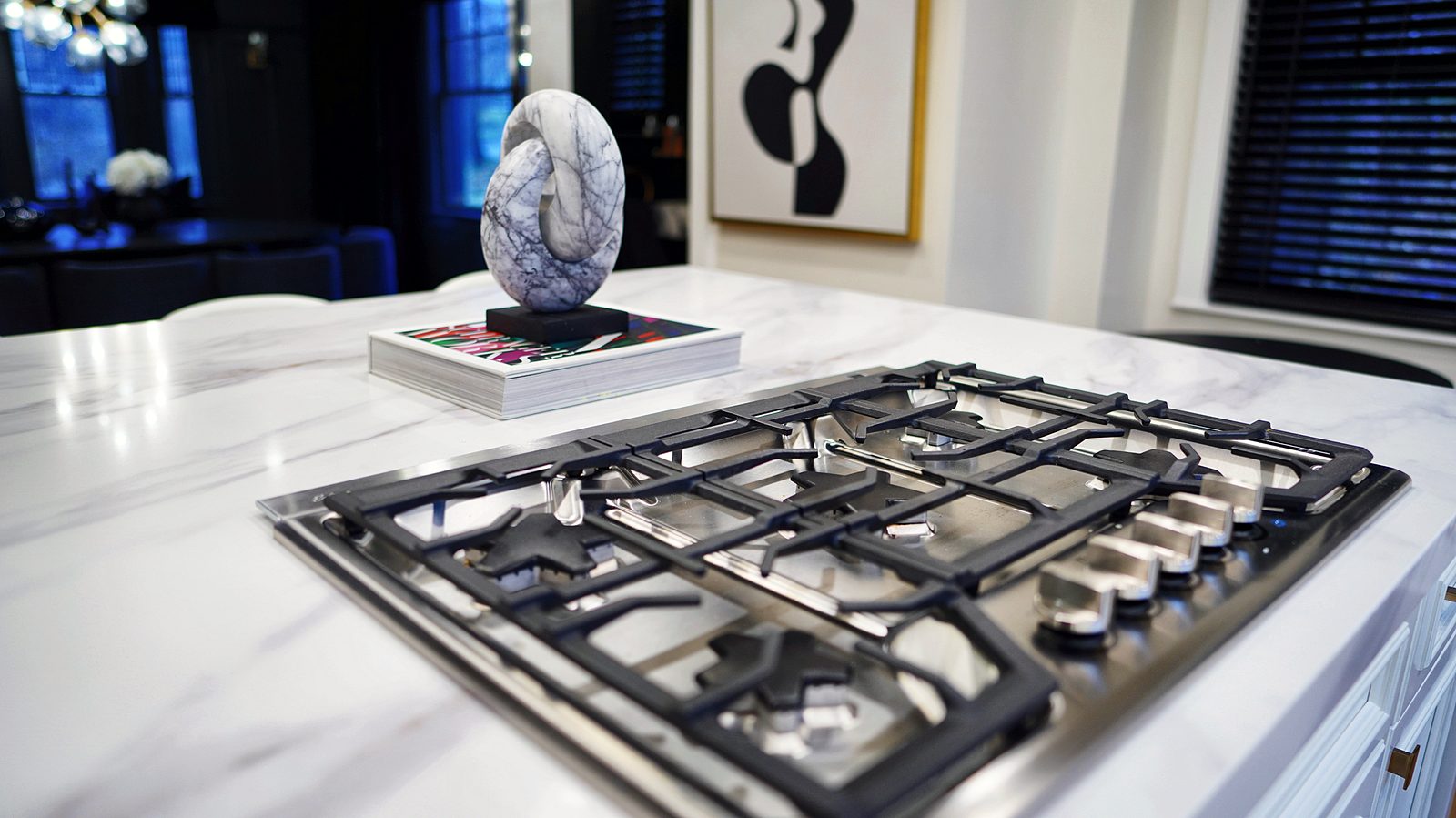 Island cooktop and quartz detail