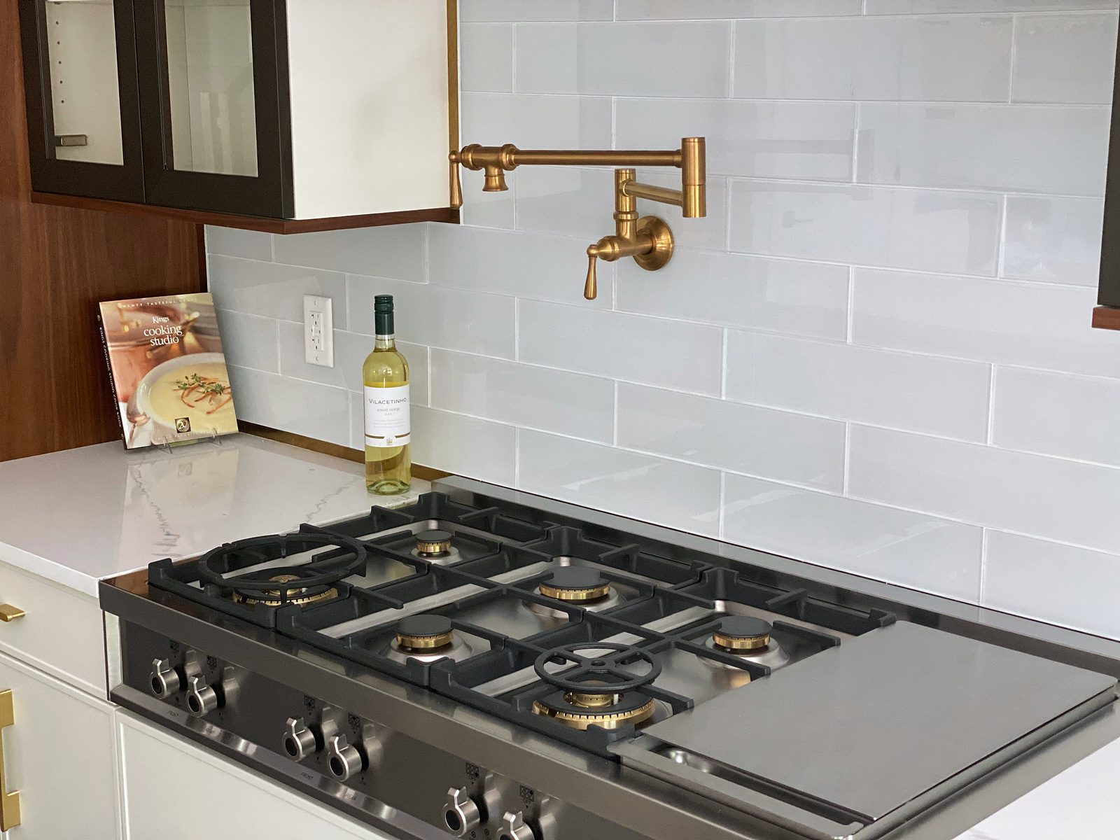 White slab and walnut kitchen with a waterfall island — photo 8